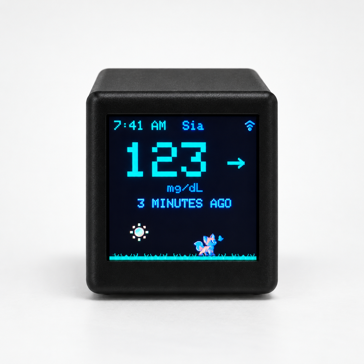 Front view of a black GlycoFox desktop glucose display with visible sample data